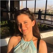 A friendly, encouraging tutor helping non-English speakers improve their English skills for everyday and academic use.